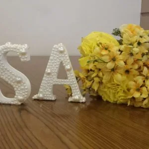 Letra decorada com pérolas